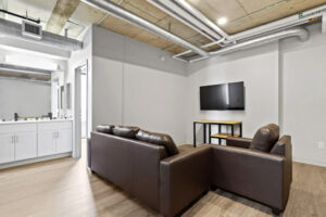 a room with a couch and a tv
