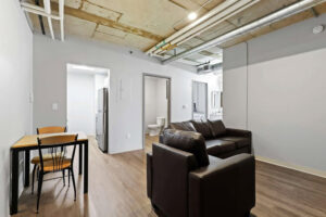a living room with a couch and a table