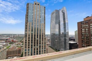 a group of tall buildings in a city