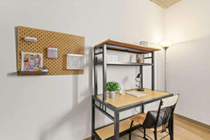 a desk and chair in a room