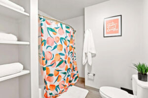 a shower curtain with oranges on it